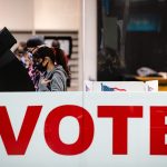 A woman casts her ballot in the 2020 general election in El Paso, Texas.