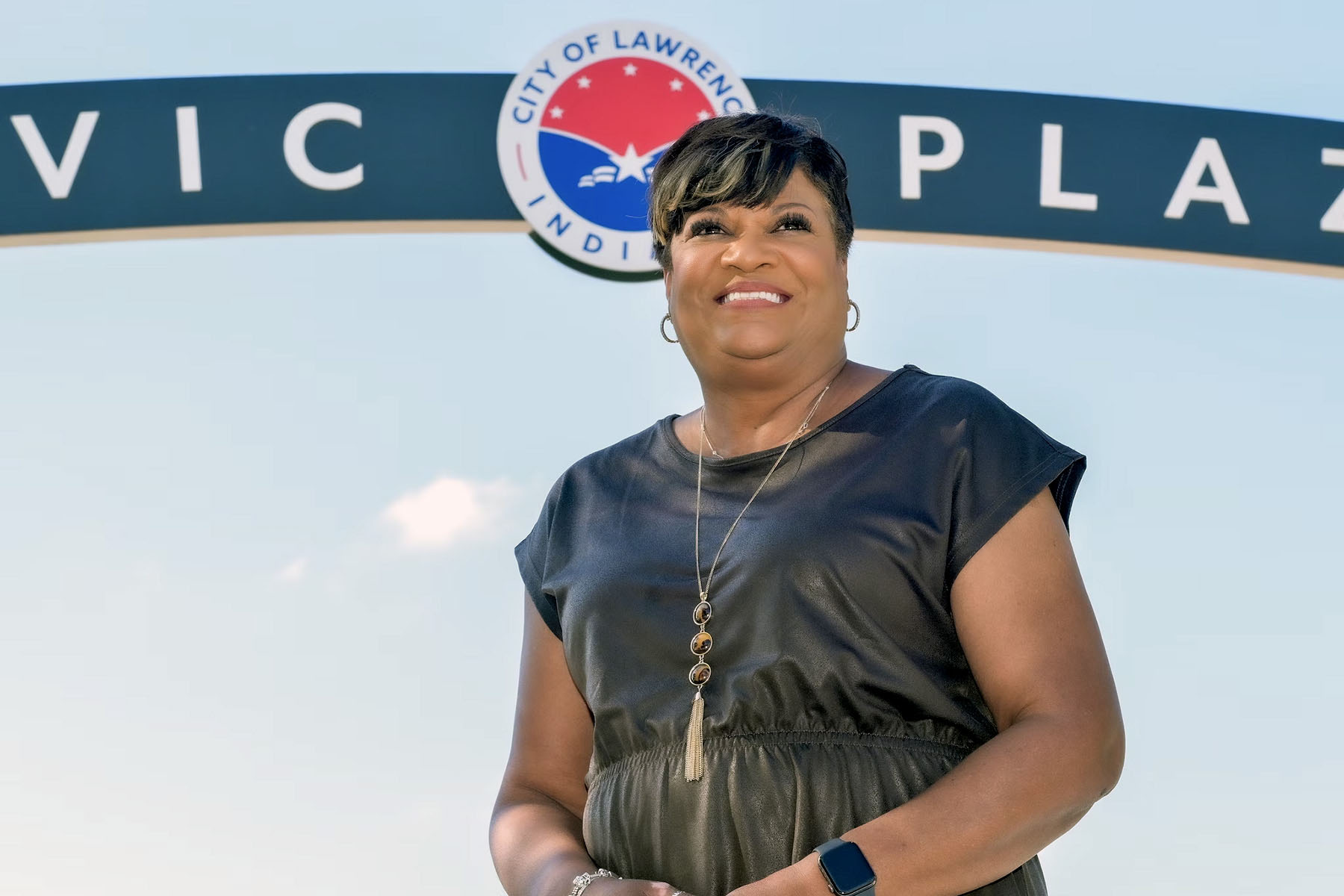 Deborah Whitfield smiles as she poses for a campaign portrait.